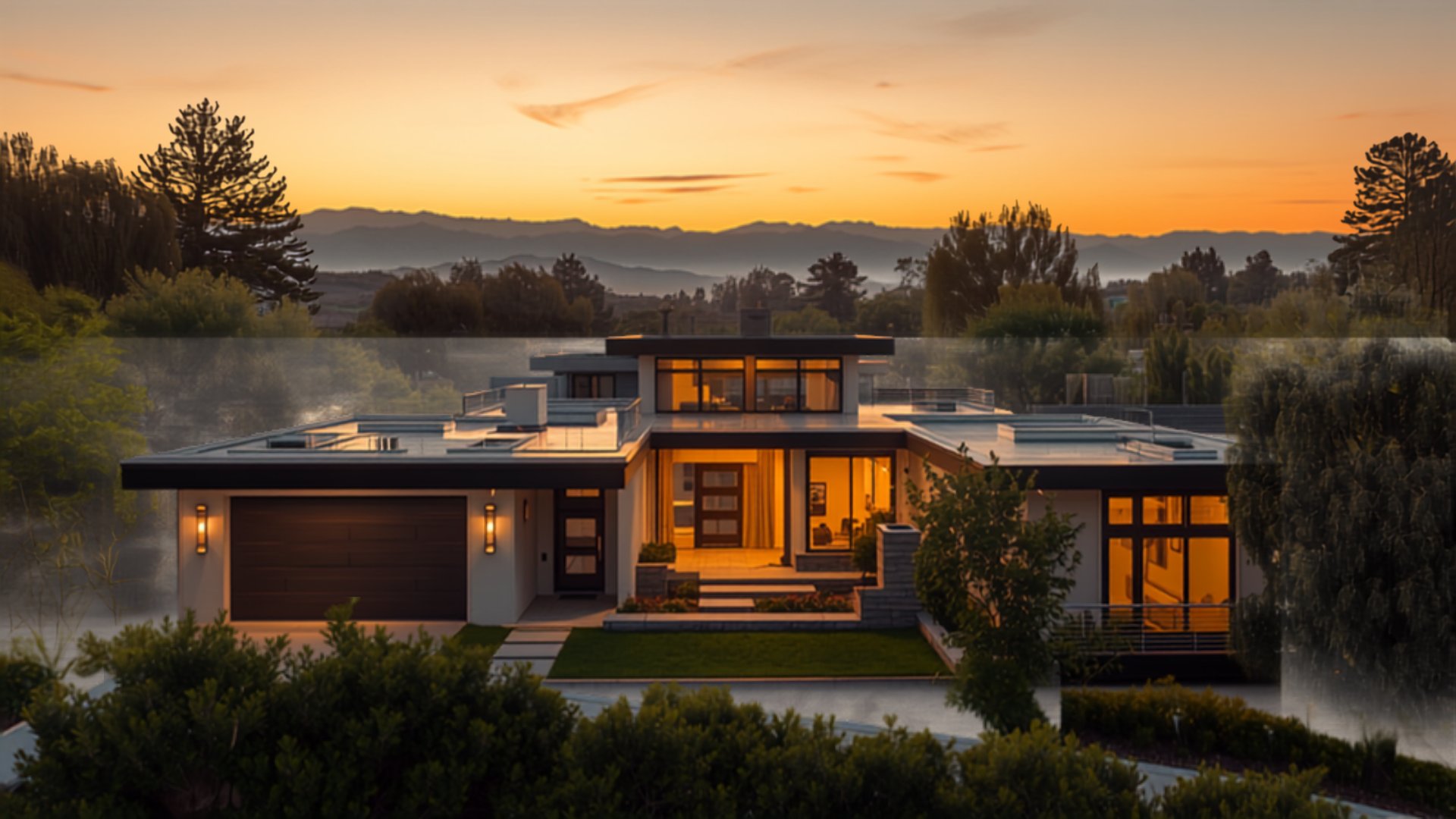 Modern single-family home at dusk with the San Gabriel Mountains in the background